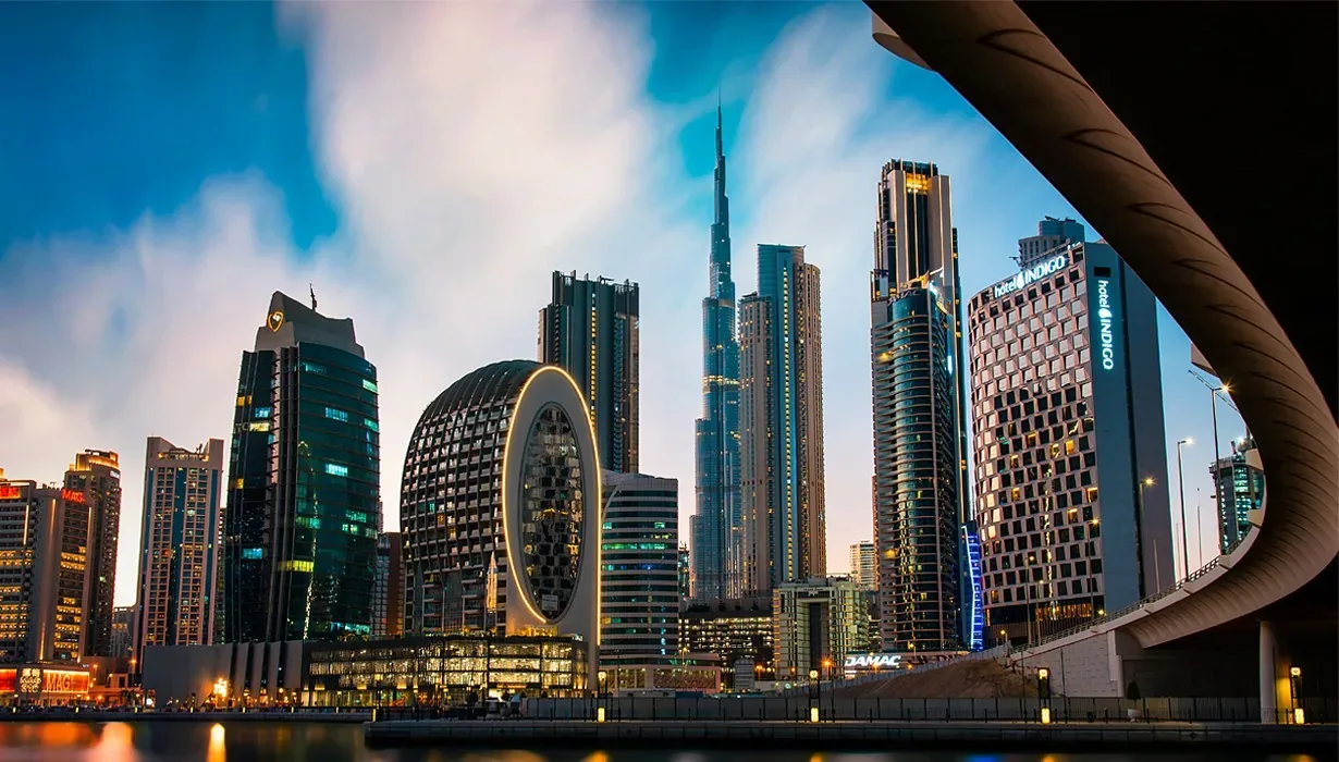 Business Bay skyline along the Dubai Water Canal at dusk